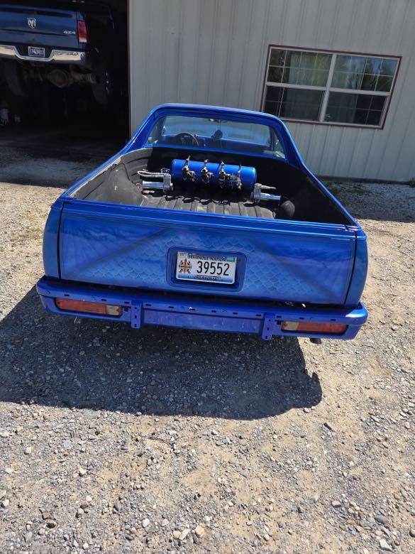 El Camino rear with air and turbo setup mounted in the bed